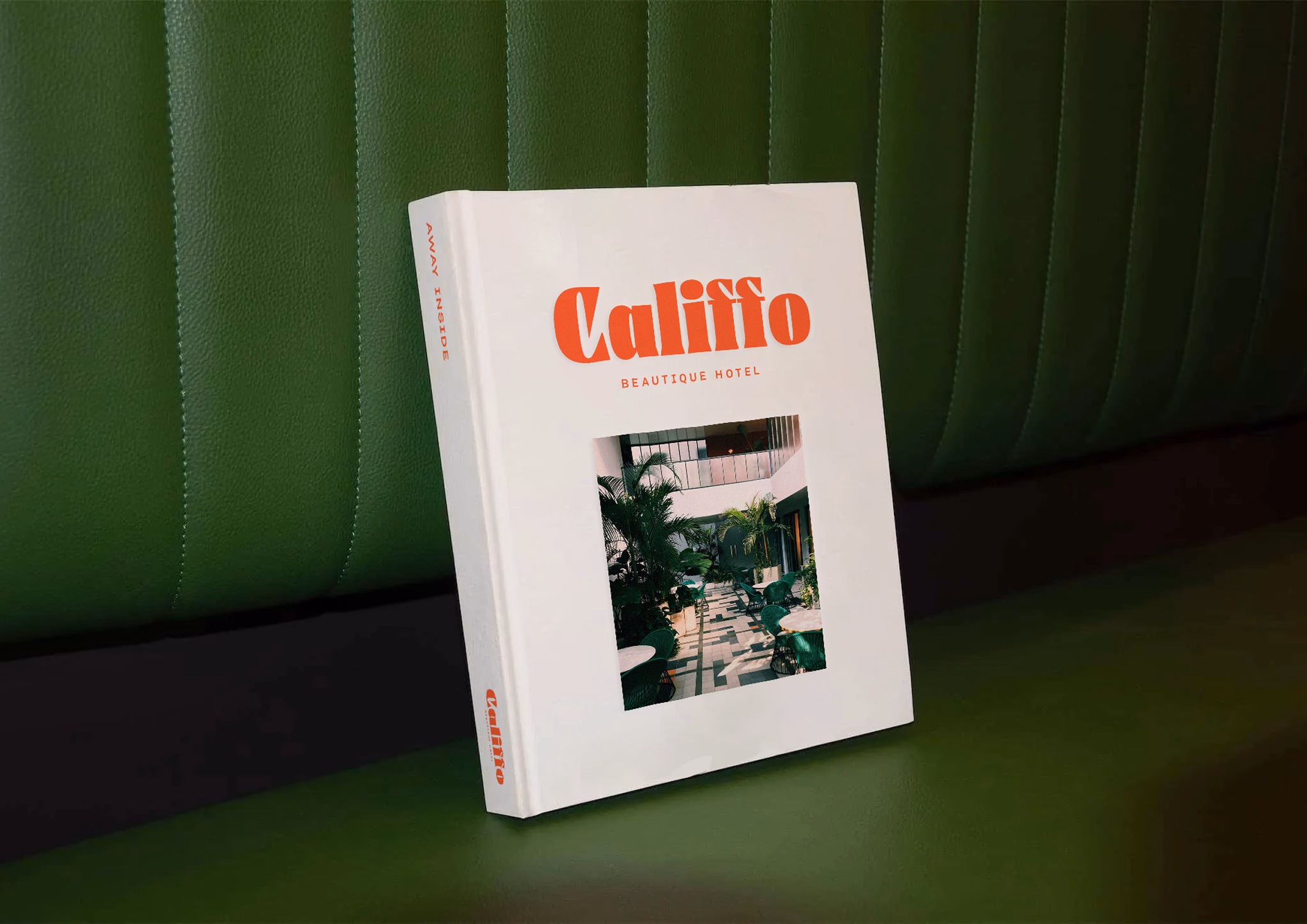 Califfo book resting on a green sofa